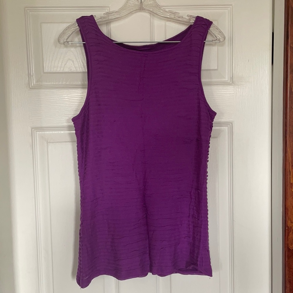 Soft, purple sleeveless top.